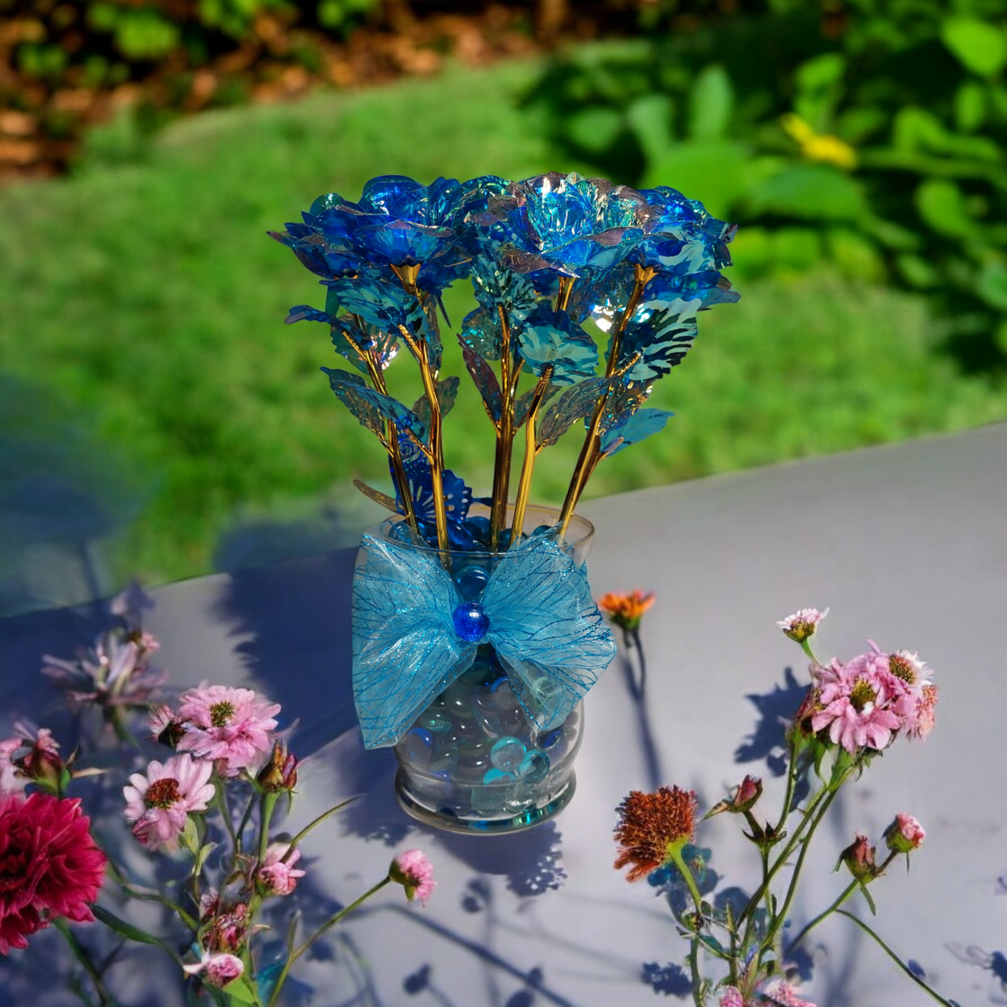 "Ocean Bliss - Iridescent Blue Floral Arrangement with Bow Accent